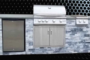 A picture showing an outdoor barbecue grill which is one of the many outdoor living products Nicolock sells