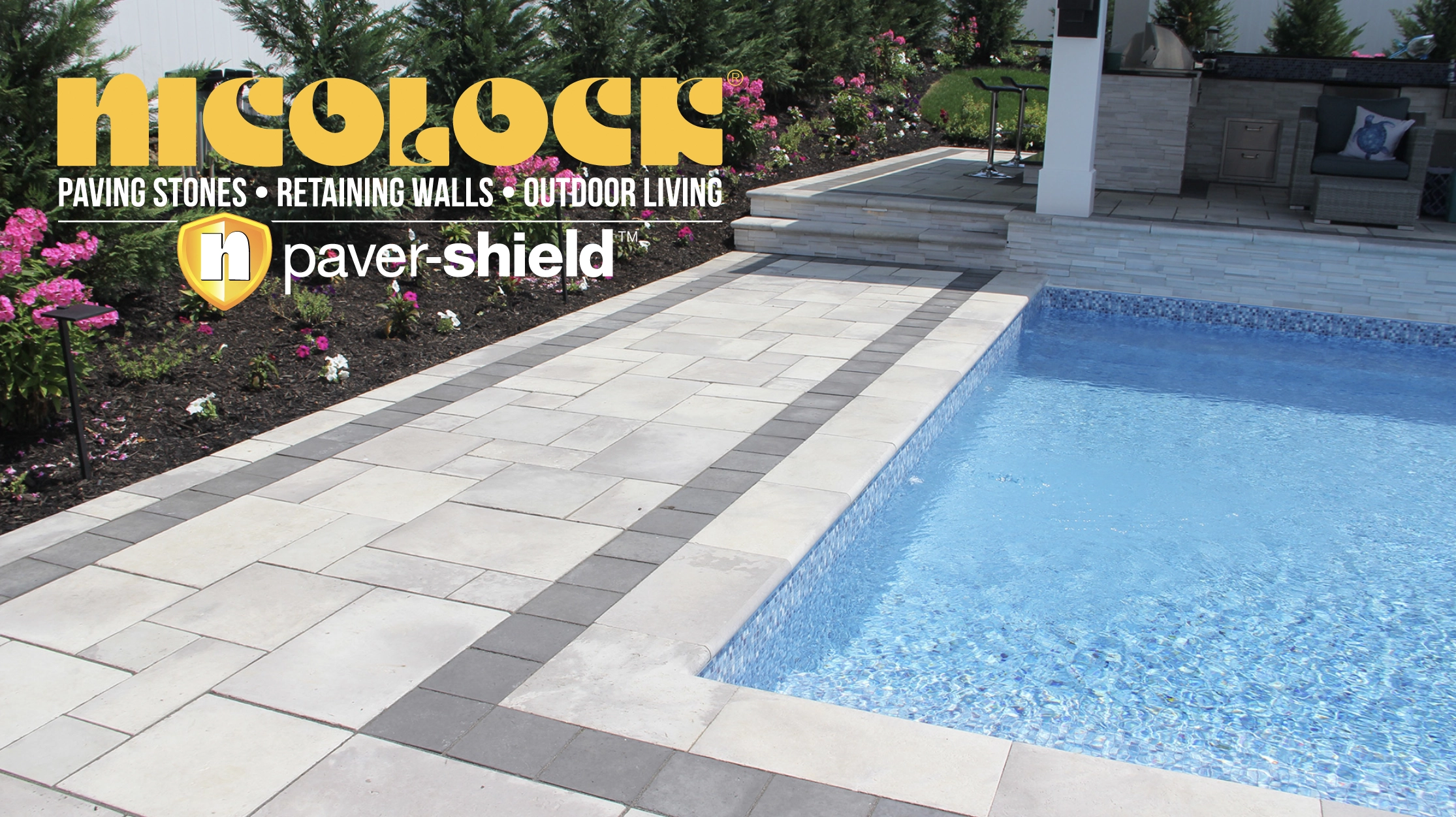 Picture of a Nicolock paver pool deck, coping and wall system