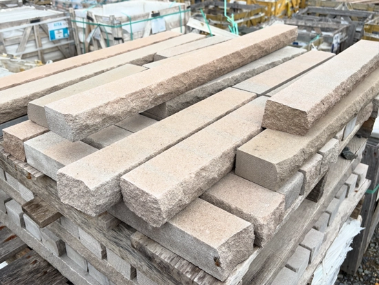 A picture of our natural stone sills for topping off stone veneer walls