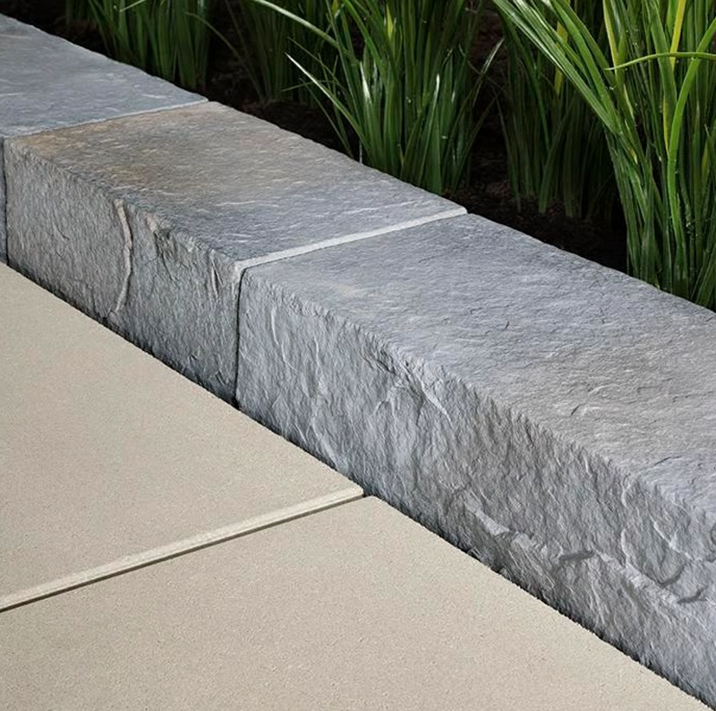 Picture of concrete garden edging stones to provide. sturdy edge to patios, walkways and pool decks
