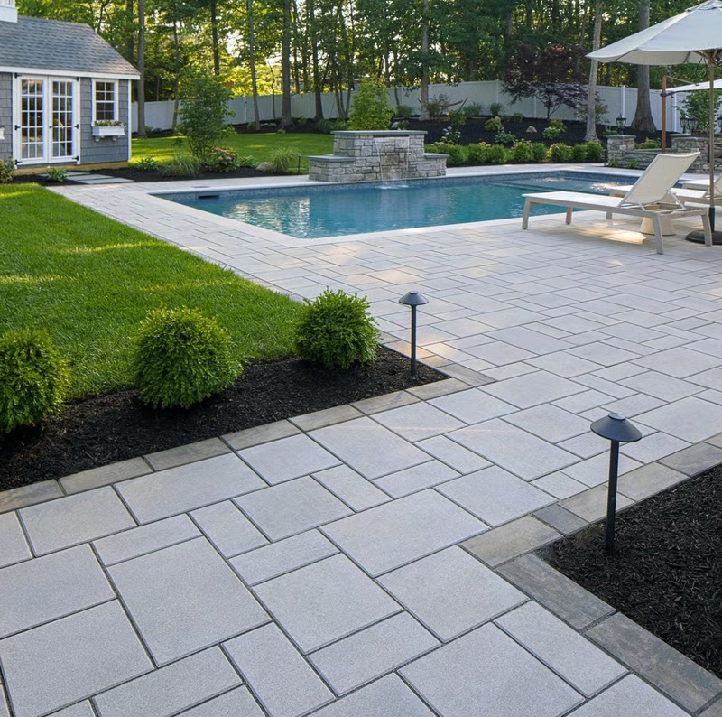 Picture of a stone slab patio using Techo-bloc slab pieces which come in bigger sizes