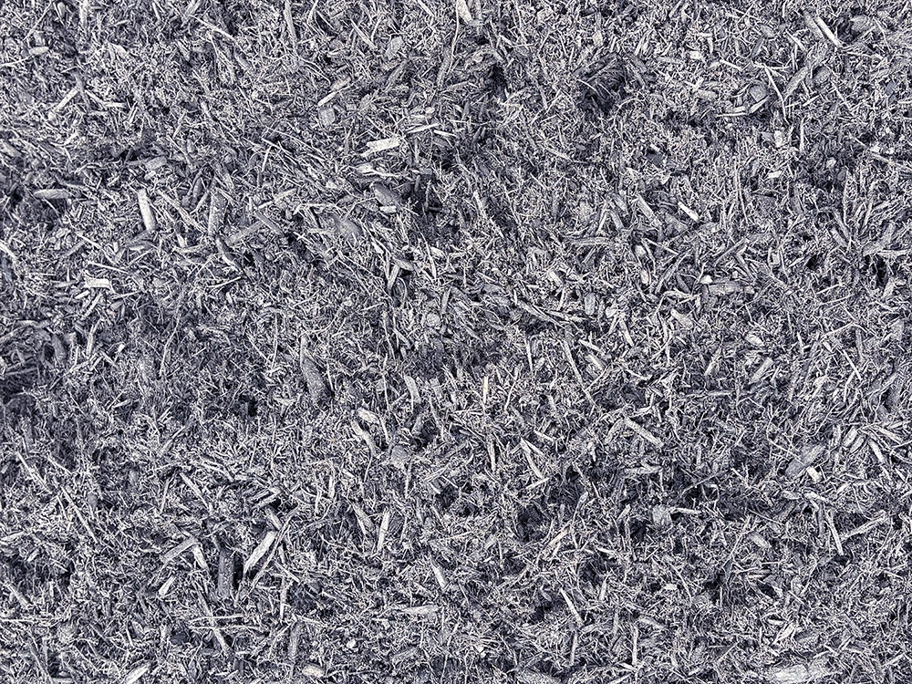 a close up picture of our black mulch