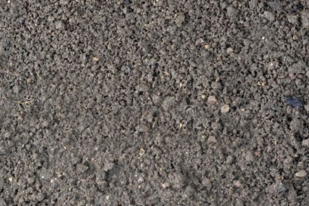 organic topsoil we sell - picture of rich dark soil - ideal for plants